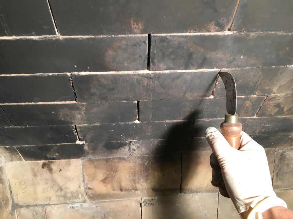 Implementing Fireproof Caulk Backer into the Cracks